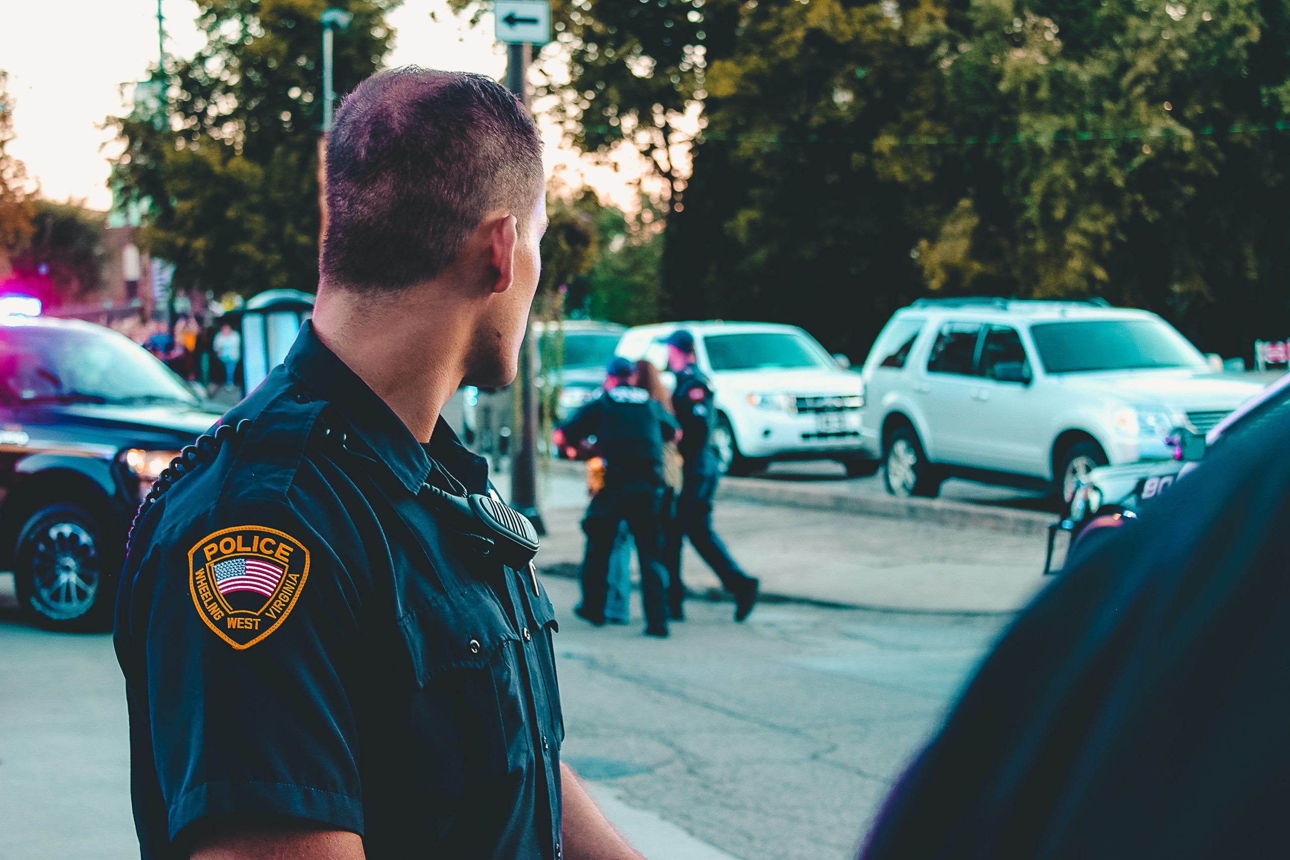 Police officer looking at a group of officers | Omaha | Berry Law