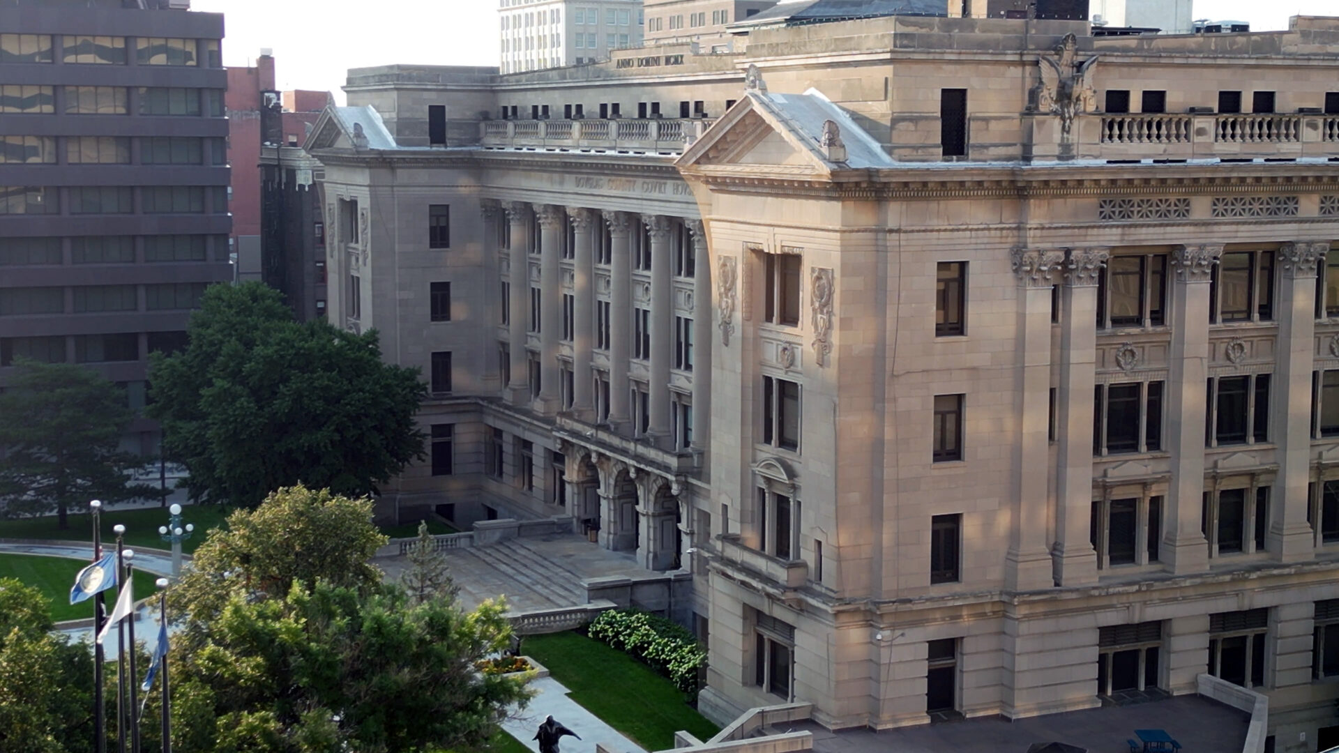drone footage of the douglas county courthouse in downtown omaha, ne on a summer morning